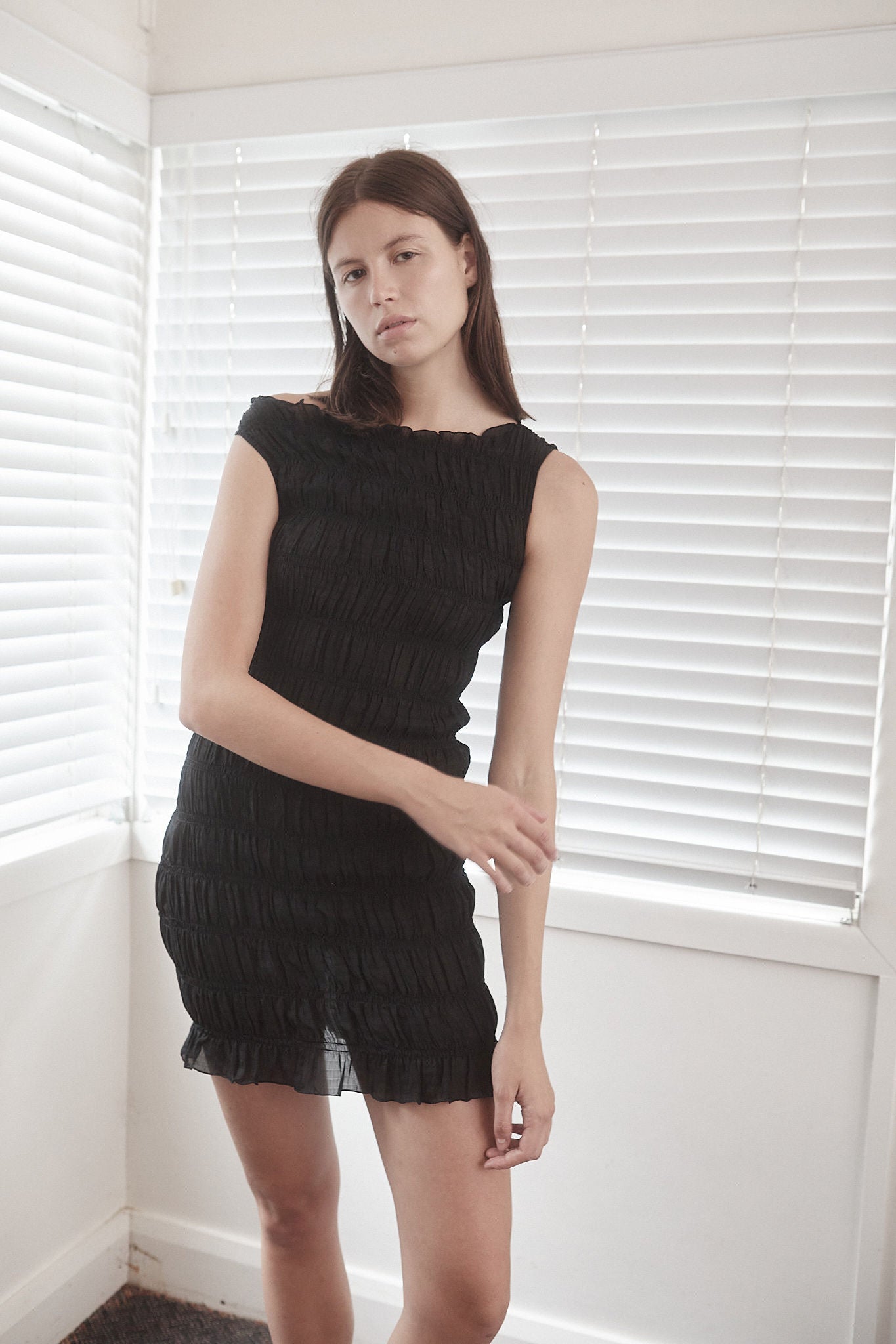 CORE Gathered Mini Dress | Black $339