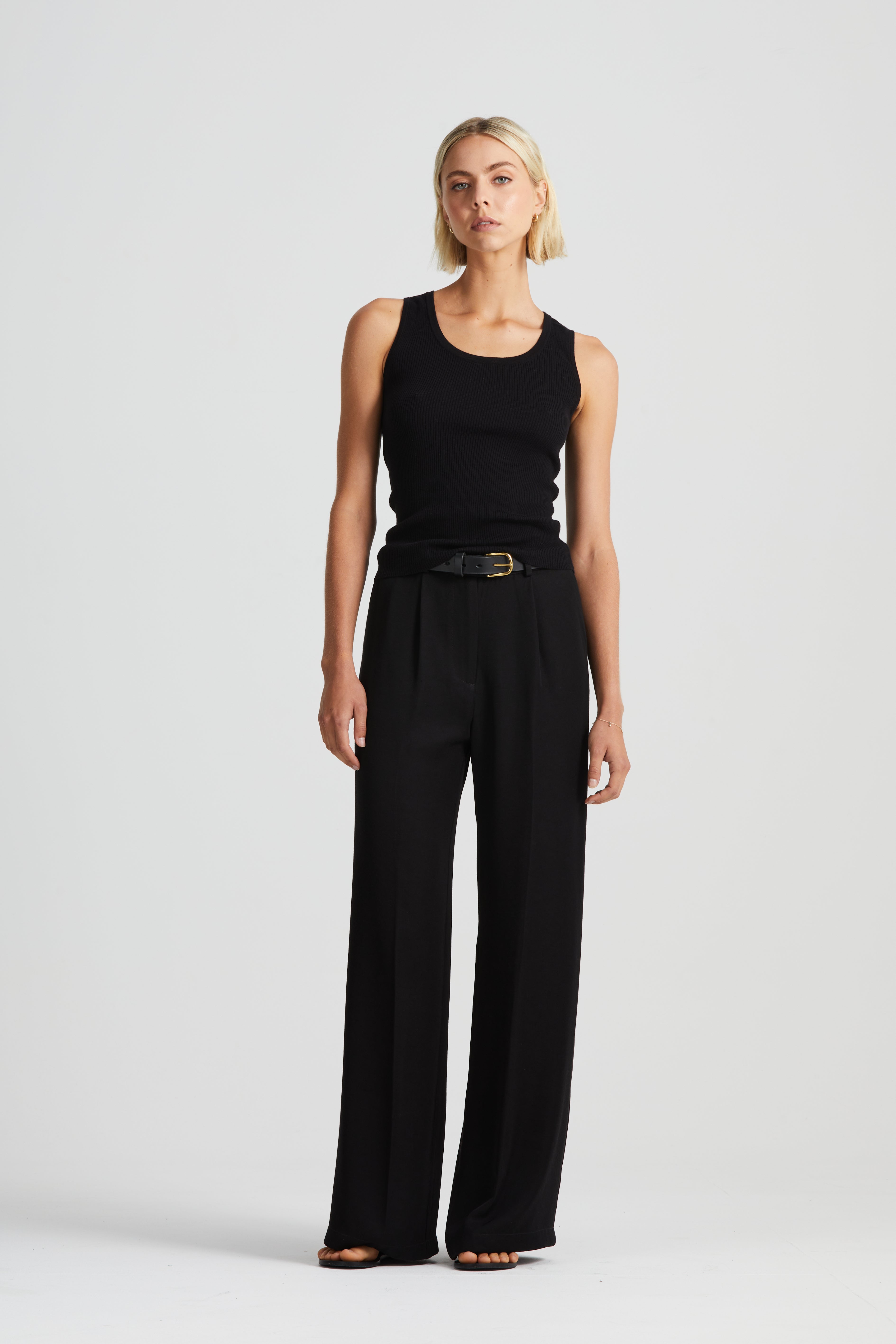 The Signature Relaxed Tailored Pleated Trouser | Black $540